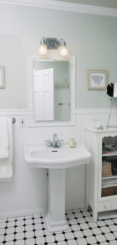 Close-up of a bathroom vanity sink with chrome tapware